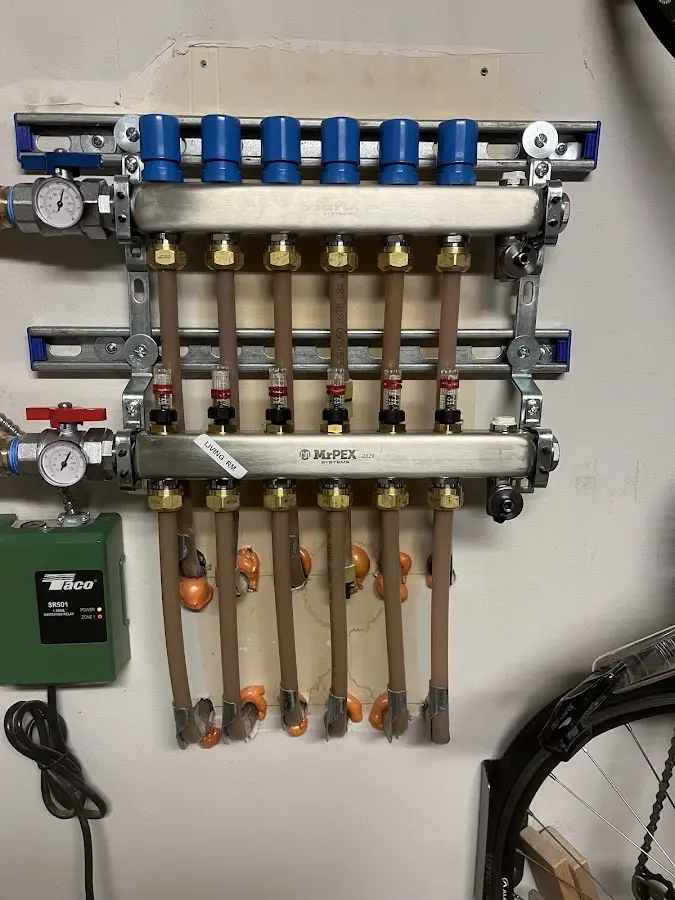 Plumber performing Leak Detection at a residential property in Two Harbors